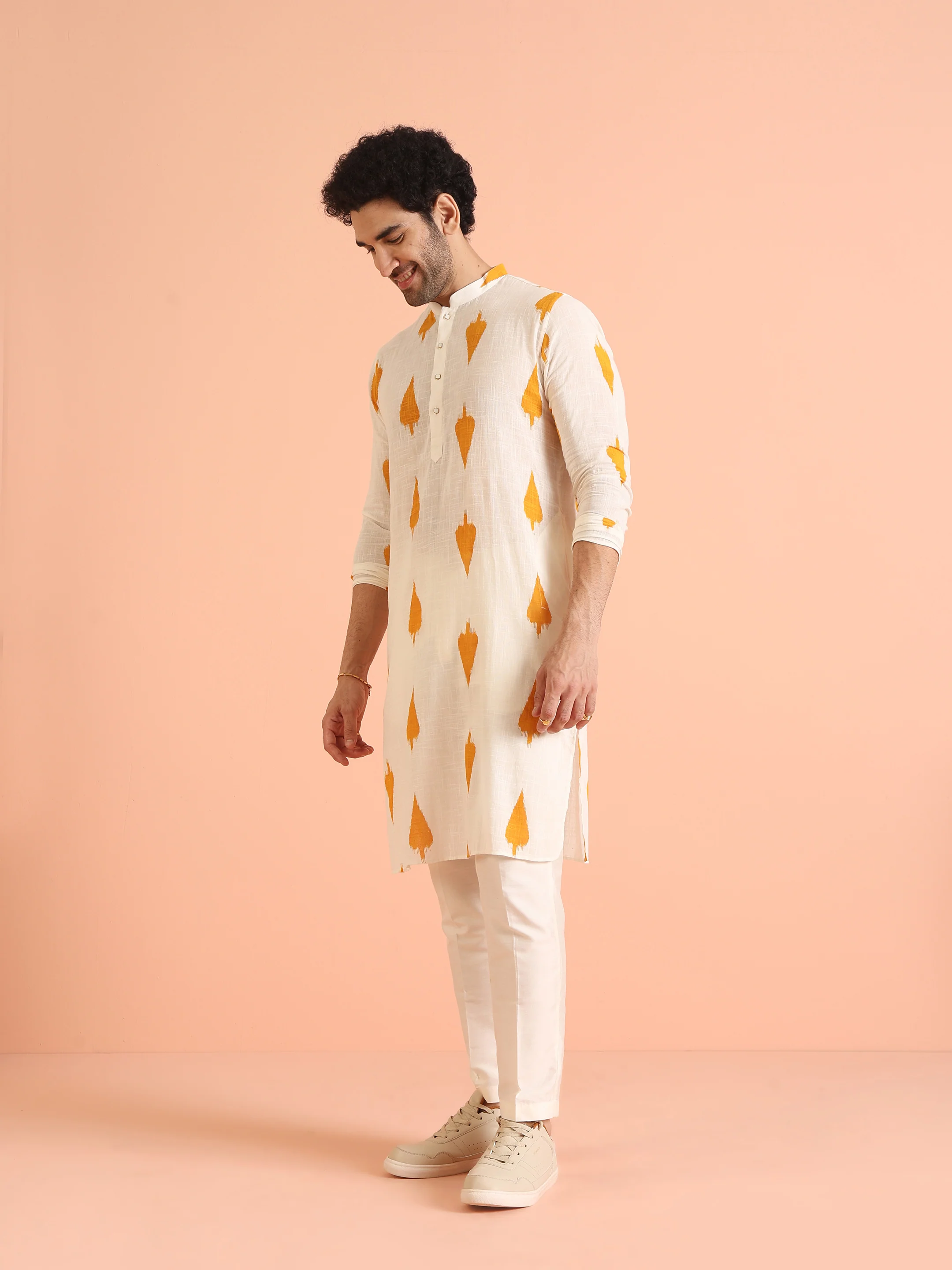 White Cotton Kurta Set with Mustard Ikat-Inspired Prints and Cream Trousers Festive & Wedding Ensemble - Image 5