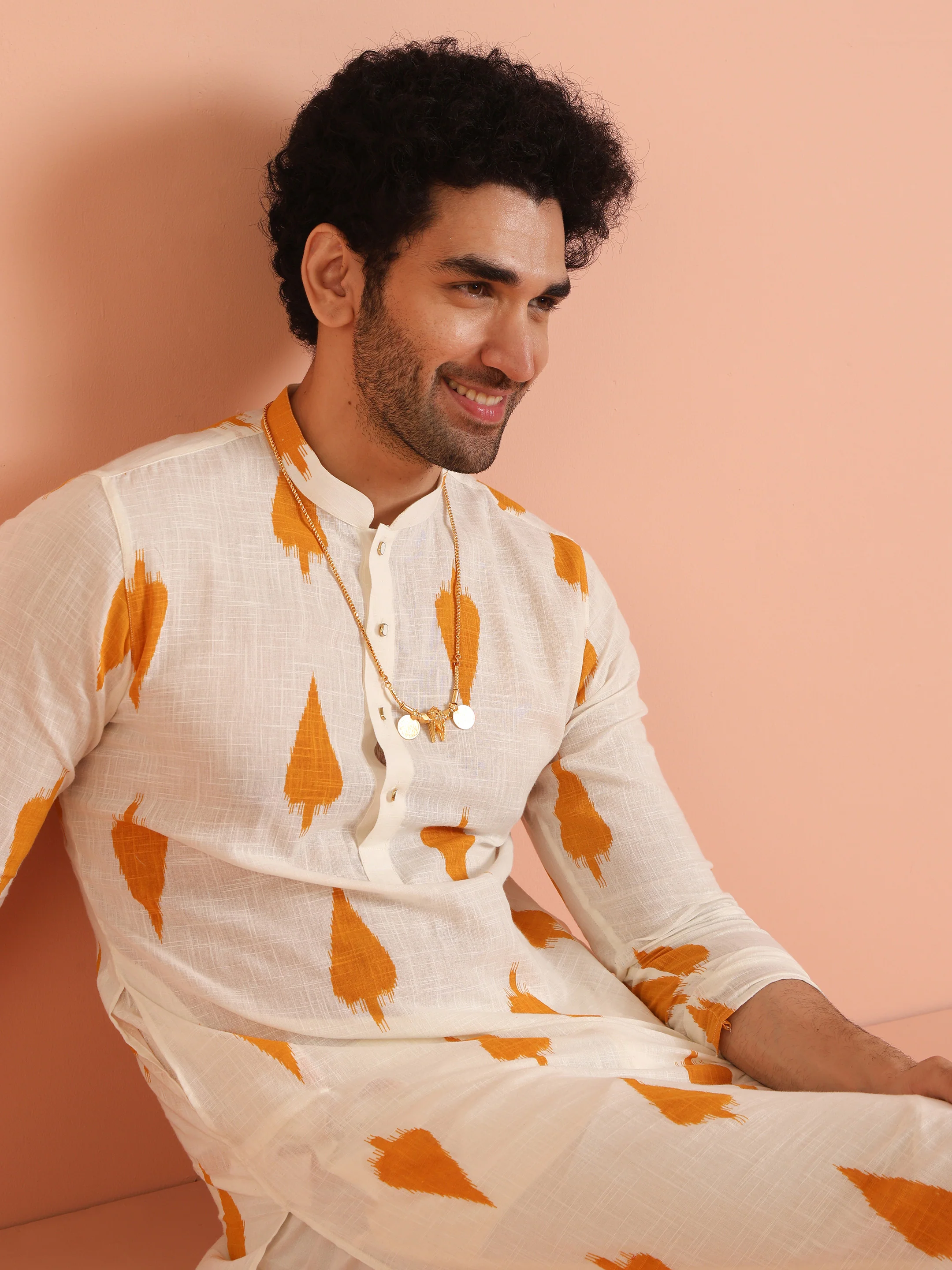 White Cotton Kurta Set with Mustard Ikat-Inspired Prints and Cream Trousers Festive & Wedding Ensemble - Image 9